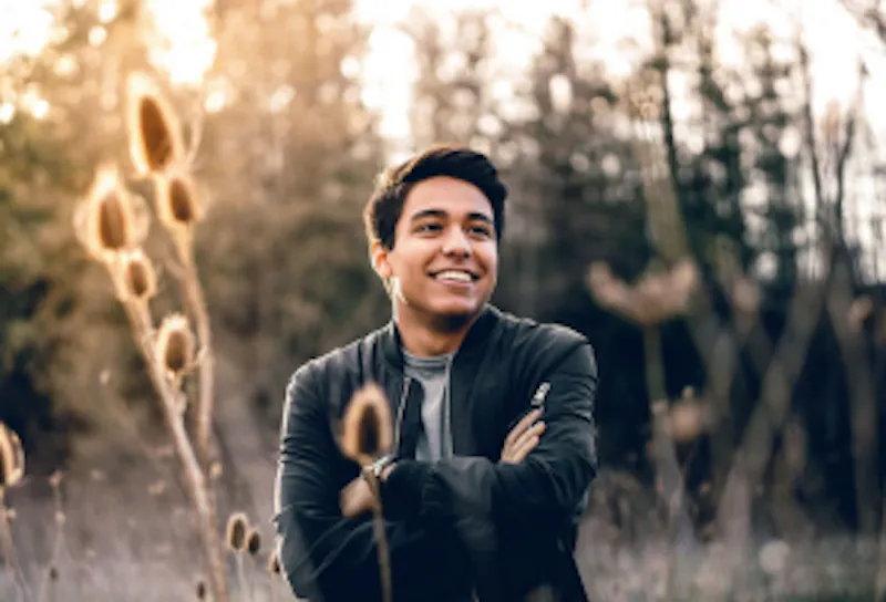 man smiling outside
