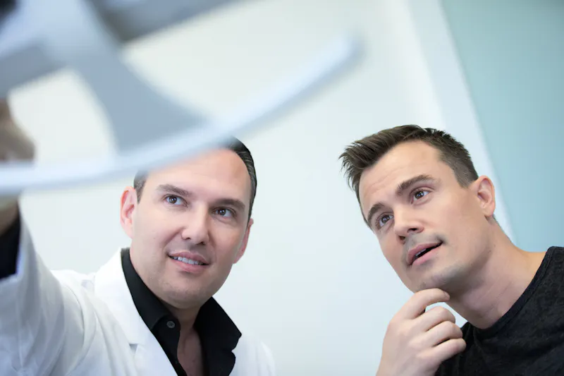 Dr. Glosman with male patient