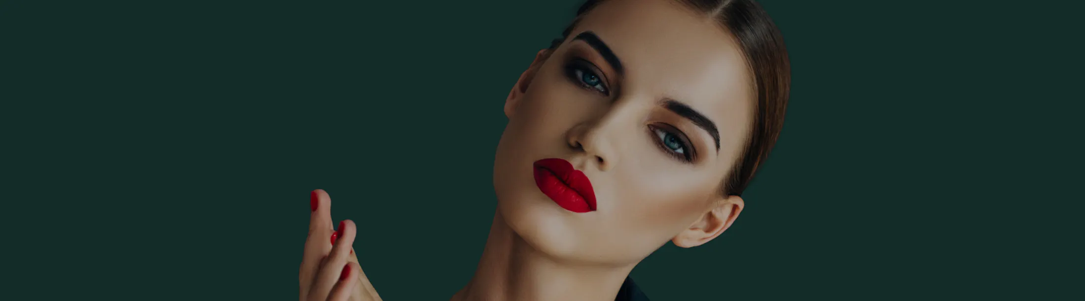 Glamorous woman with red lips and dark eyebrows
